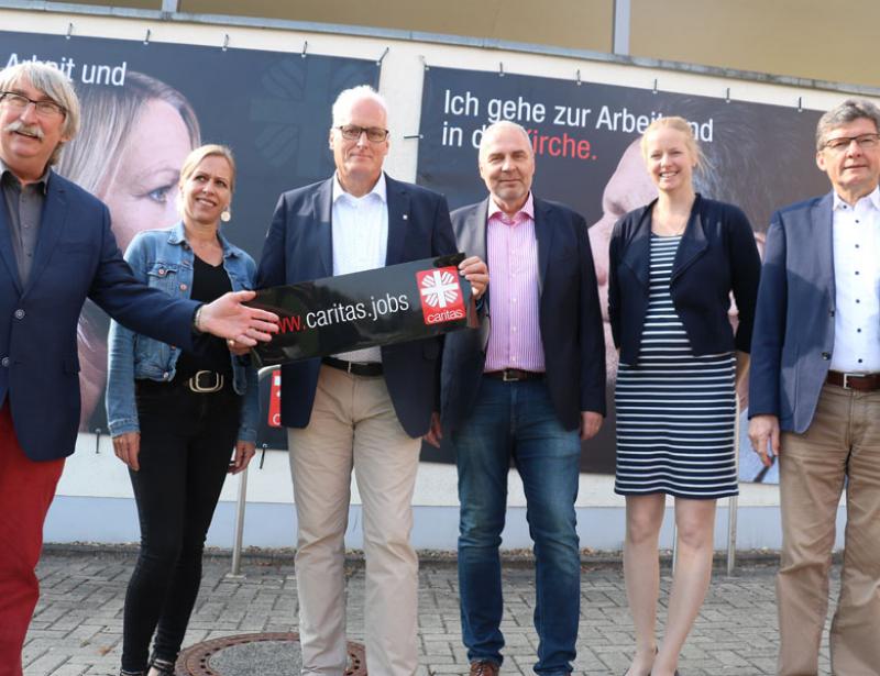 Mitarbeiter zeigen Gesicht